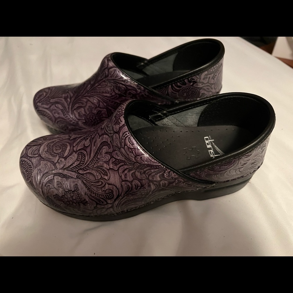Brand new Dansko clogs! Tried on when purchased but never worn!